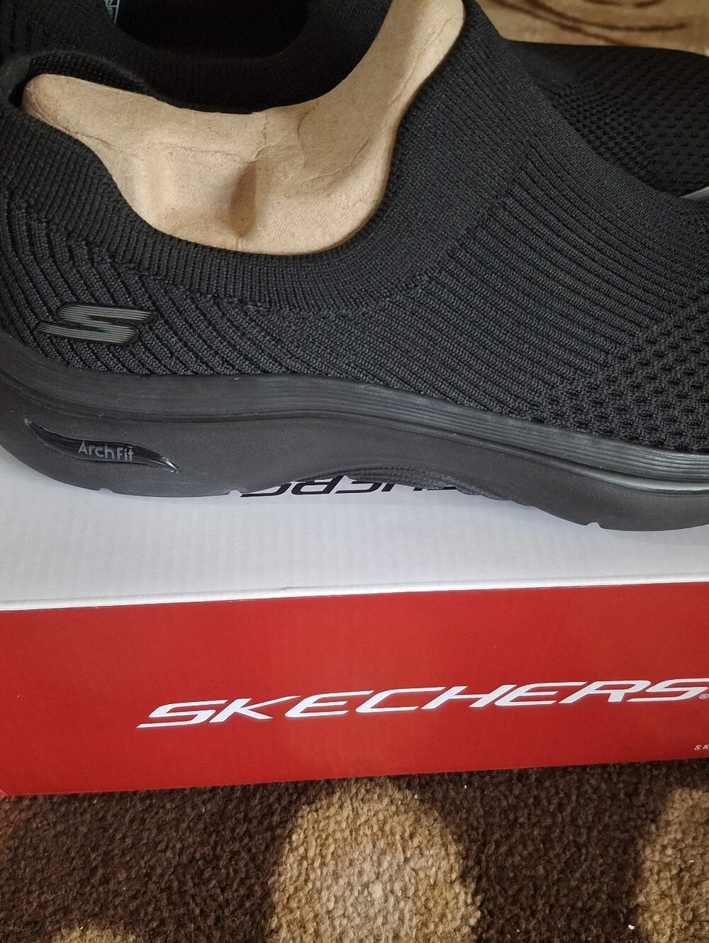 Skechers Arch Fit Slip-On Knit Sneakers in Black